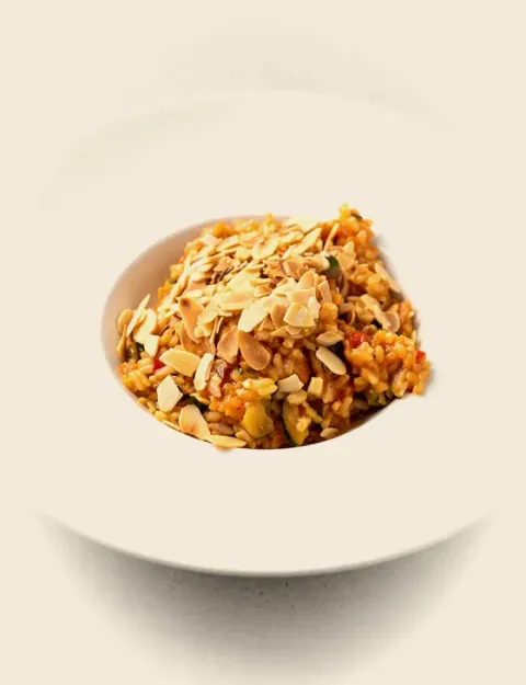 Risotto de verduras con almendras
